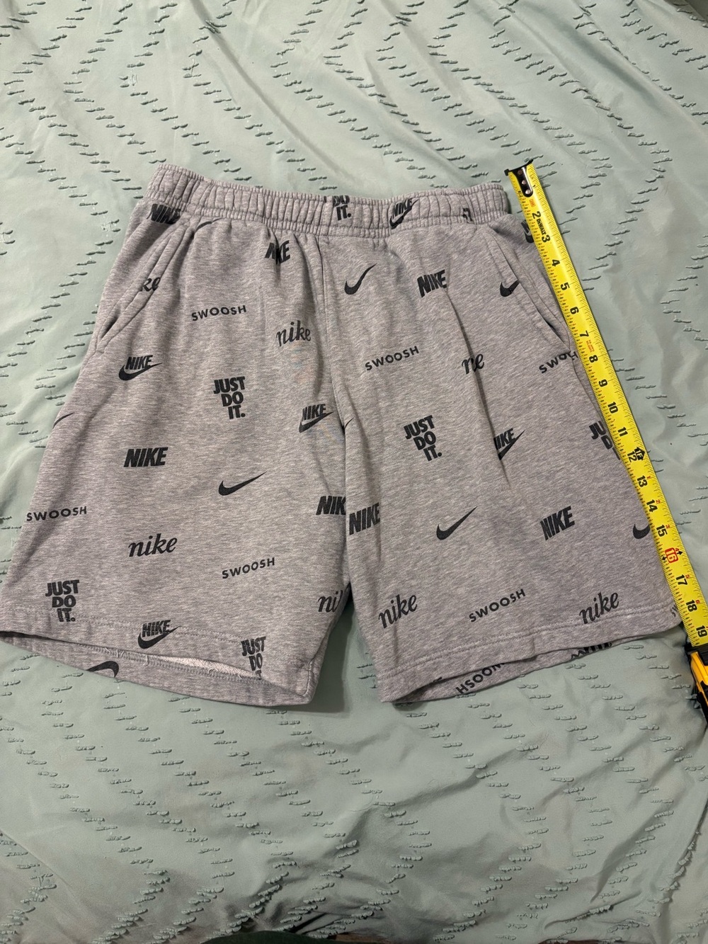 Nike Men’s Gray Athletic Shorts with Black Logo Allover